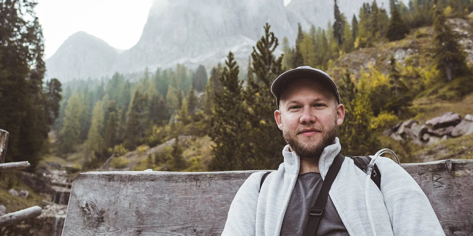 a portrait of me with the italian dolomites in the background